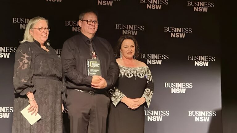 People accepting a business award